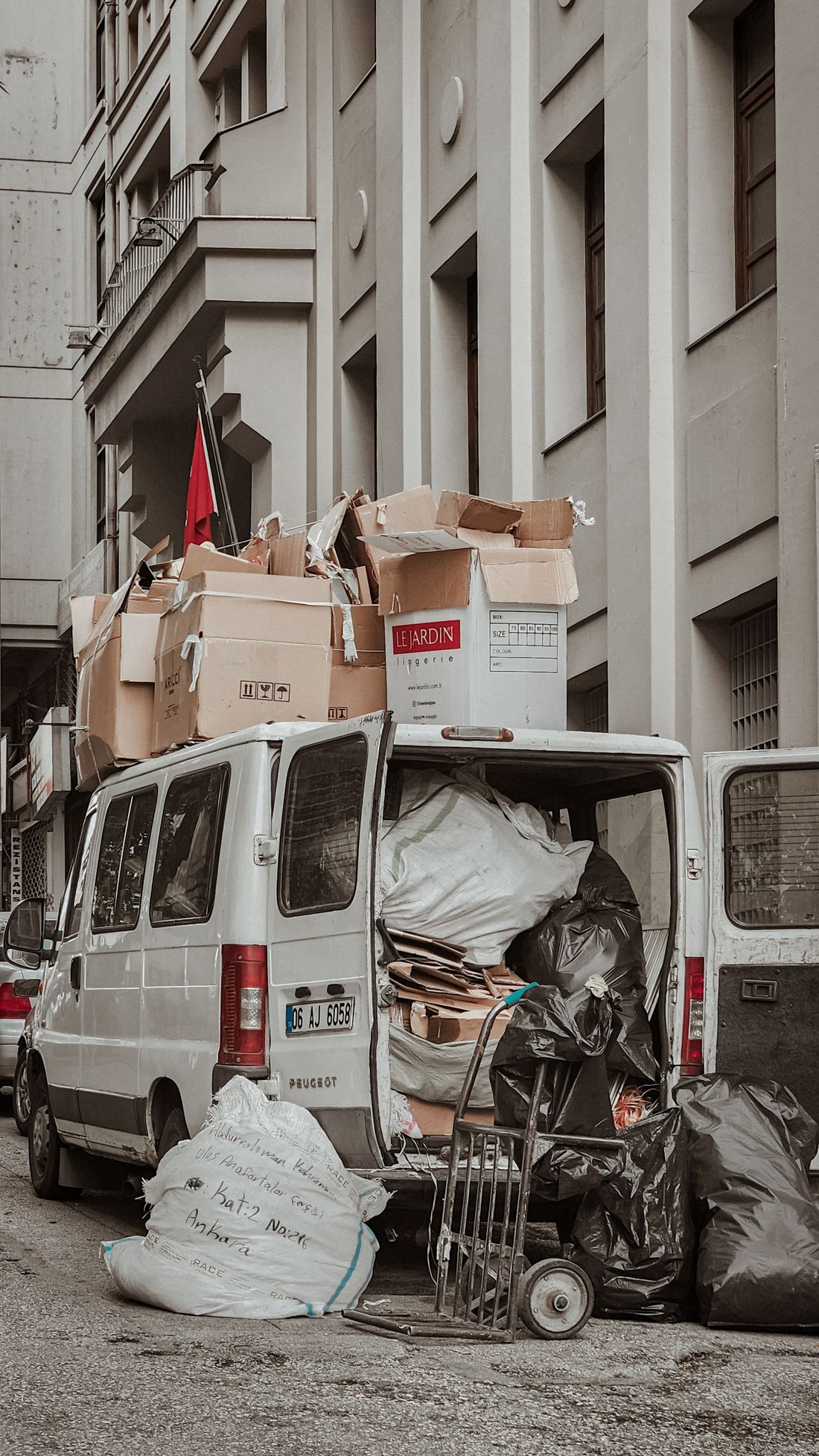 A lorry loaded with cleared furniture and general waste for disposal