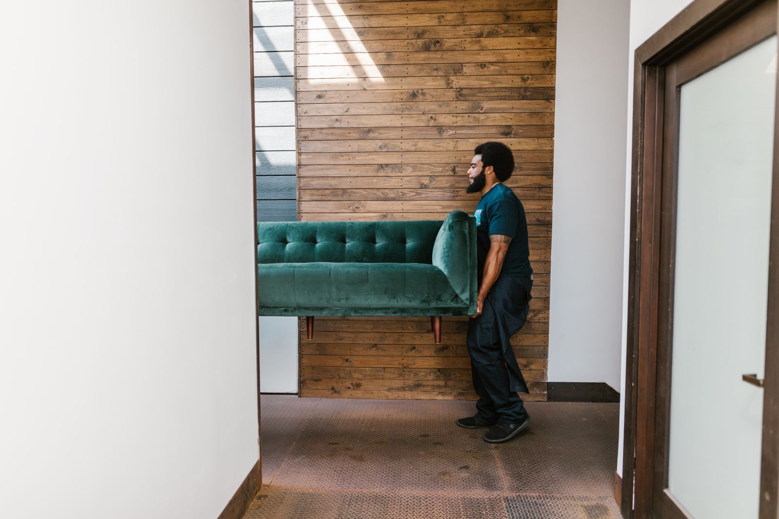 Relo movers carefully handling furniture during a Singapore home move