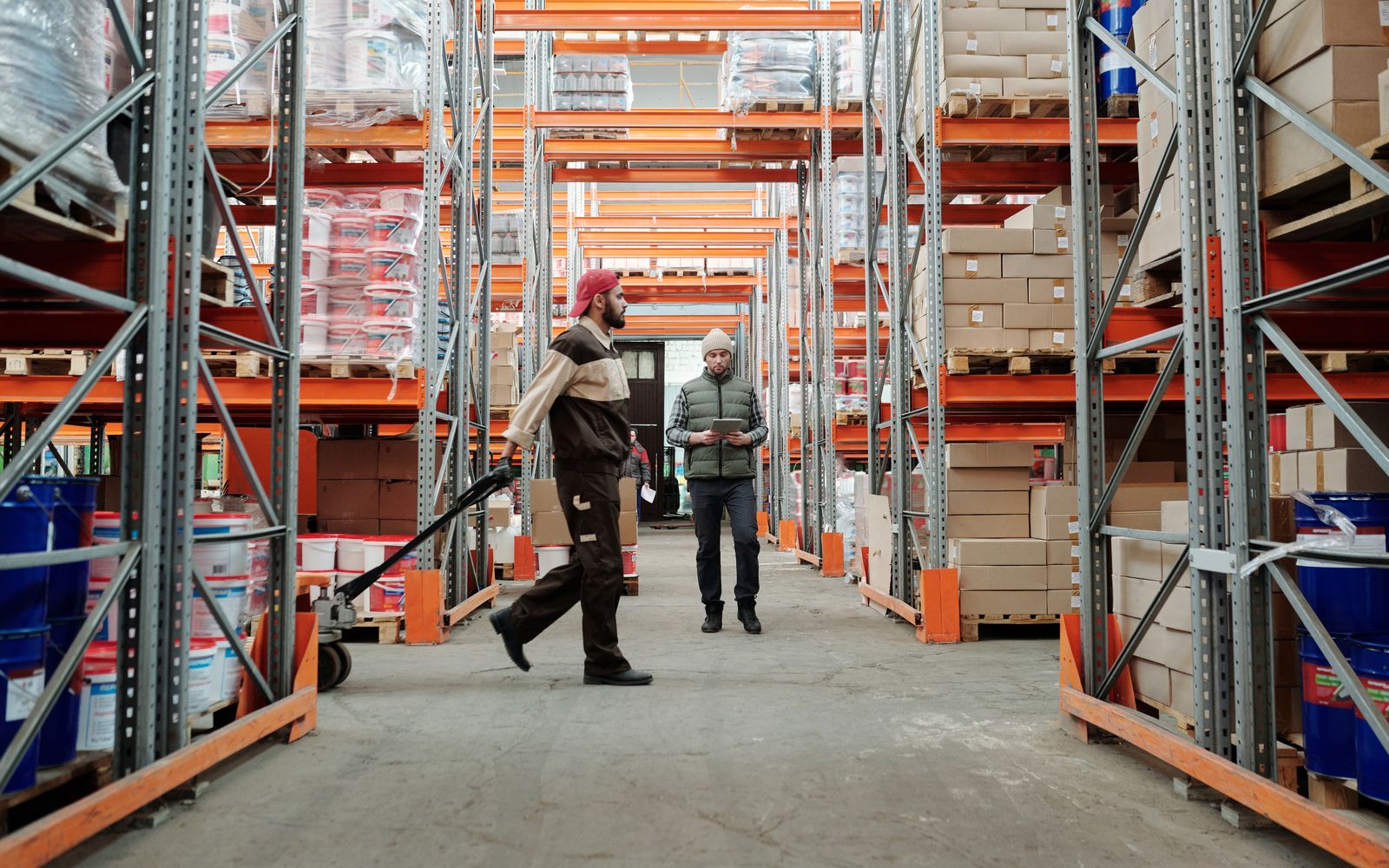 Relo warehouse crew picking and packing in a Singapore warehouse aisle